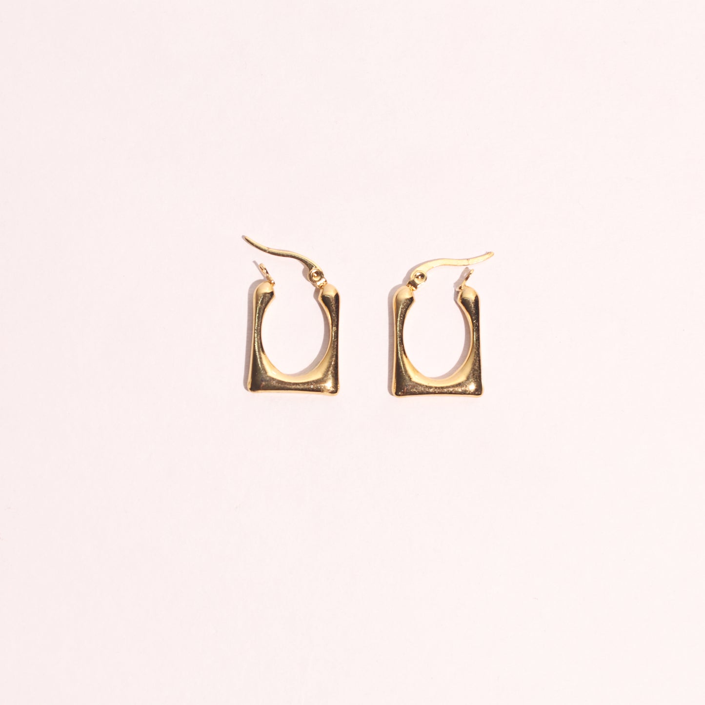 Golden Curve Statement Earrings