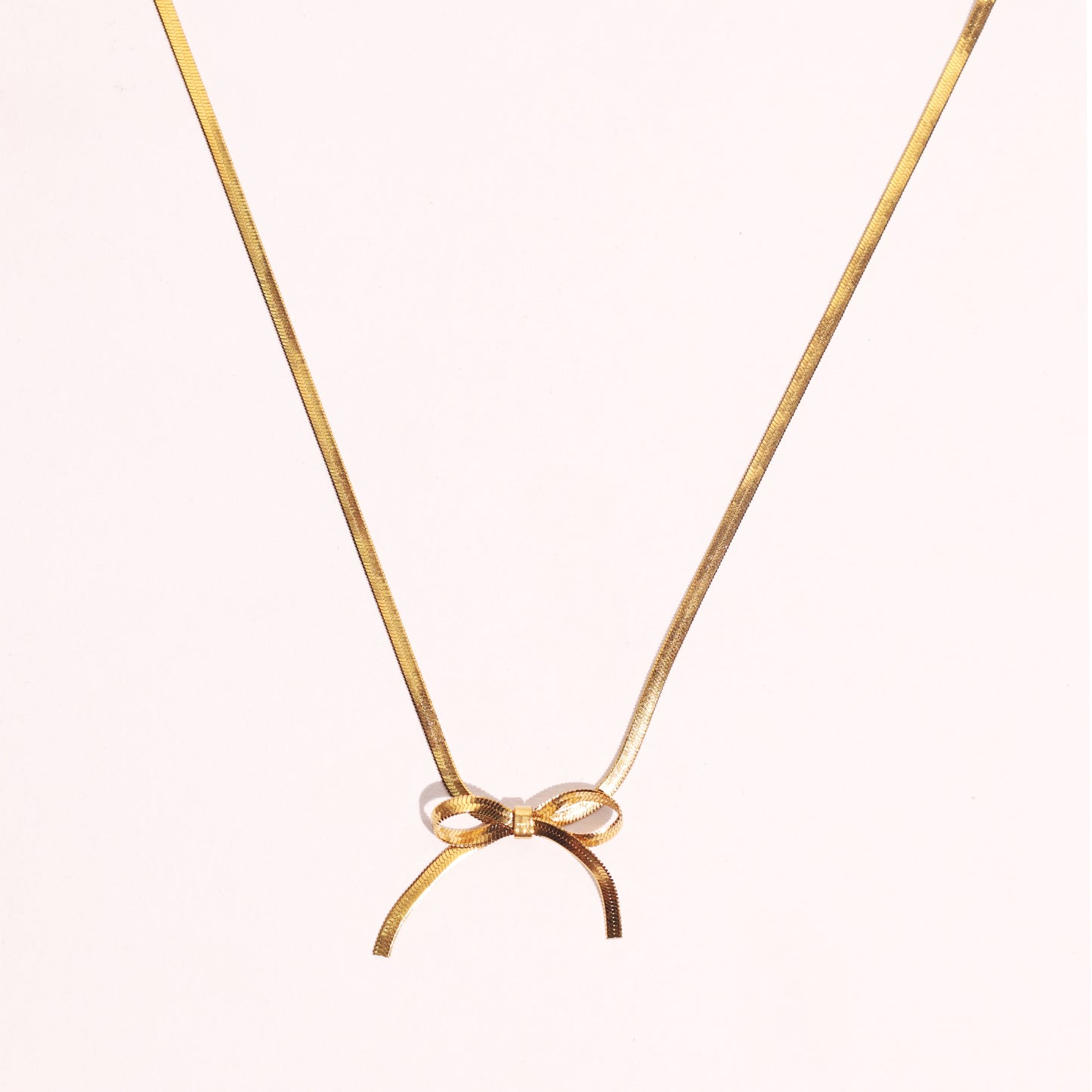 Gold Bow Necklace – Elegant & Feminine Jewelry
